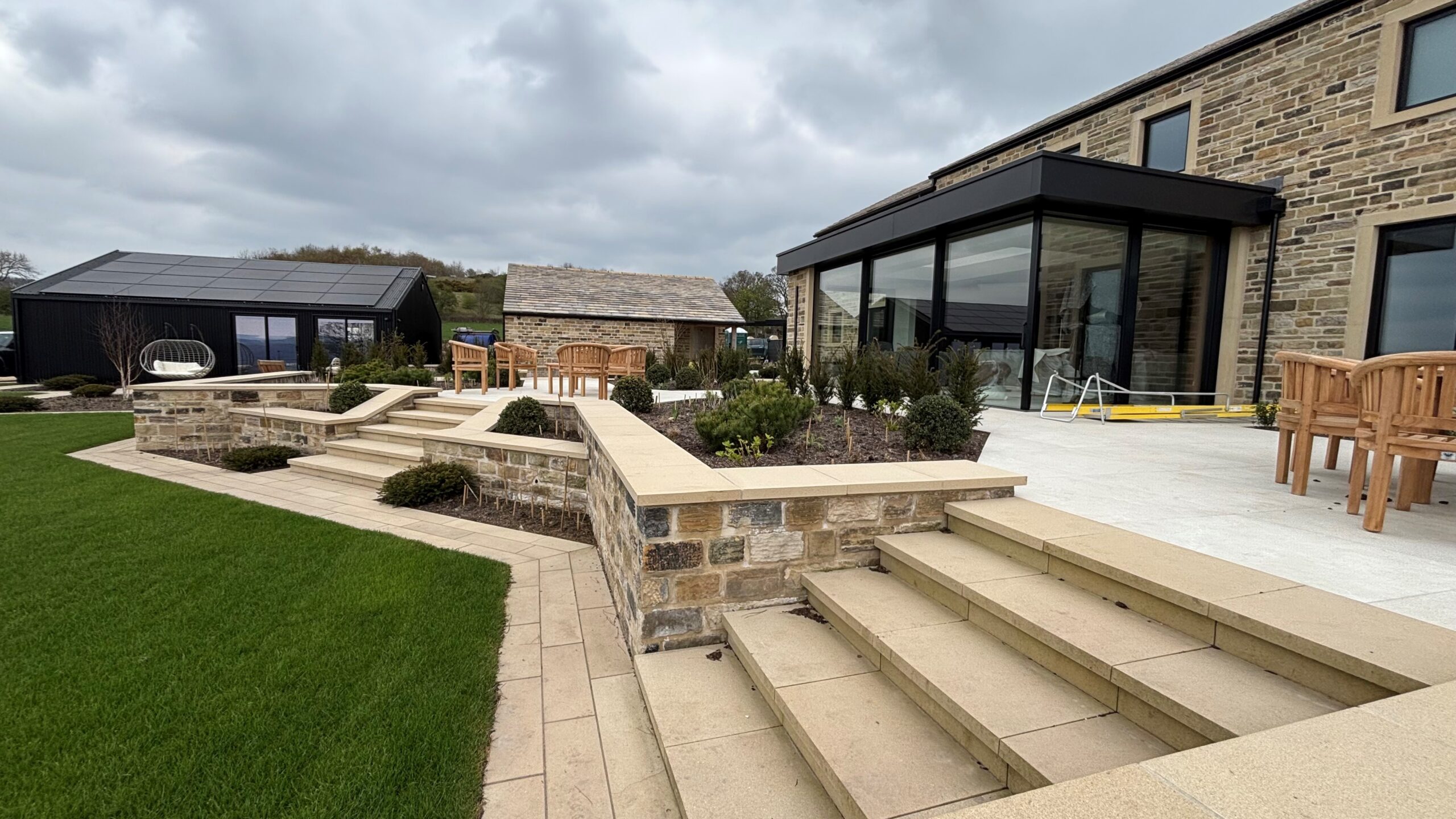 Walling, paving, step treads and coping