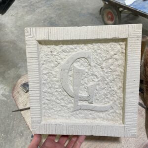 The block has a sunken panel with a drafted margin and sparrow pecked finish.